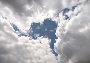 Huge clouds leaving a hole in the sky