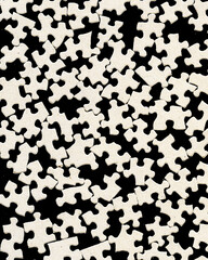 black and white back side of puzzle pieces