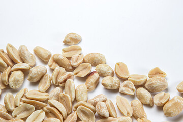 Peanuts on a white background. Salty beer snack