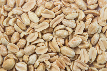 Peanuts on a white background. Salty beer snack