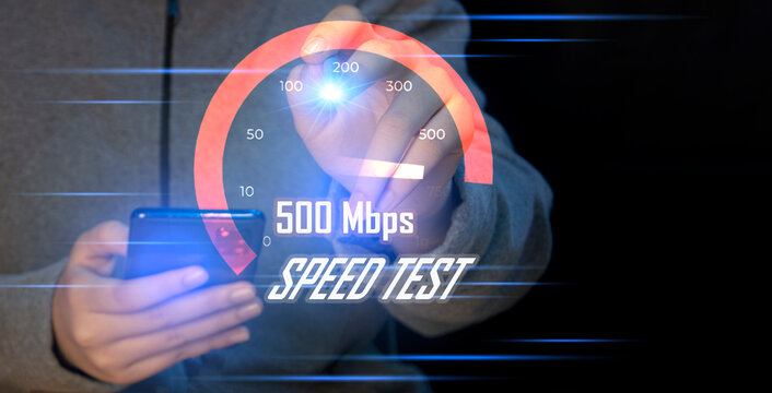 fast internet connection speedtest network bandwidth technology Man using high speed internet with smartphone and laptop computer. 5G quality, speed optimization.