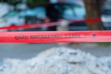 Watch out, power line - Bosnian barricade tape