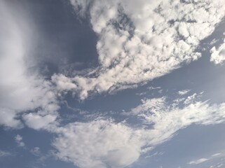 Stratocumulus forming in the blue sky