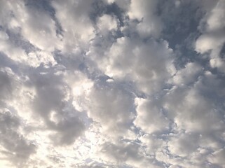Stratocumulus large cotton clouds in the sky