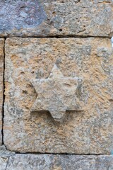 close up on the star of David on the stone wall of a small church in Baabdat, Lebanon