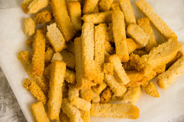 Aromatic salty crackers with the taste of mushrooms from rye bread macro. A tasty snack for beer.