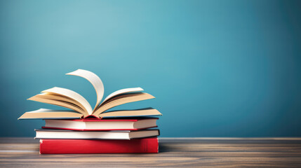 Naklejka premium Opened Book pages on blue background.Created with Generative AI technology.