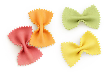 Naklejka premium colorful farfalle pasta isolated on white background with full depth of field. Top view. Flat lay.
