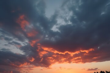 Fototapeta premium a sunset over the desert with clouds on a blue sky