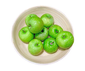 Green apples in a bowl isolated png file