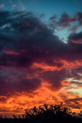 the sun rays shining against the looming clouds, sun rays coming down through a cloudy sky. AI Generated