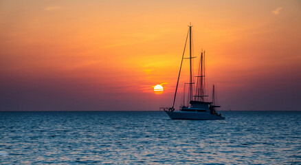 shadow sailboat that can be seen in the distance