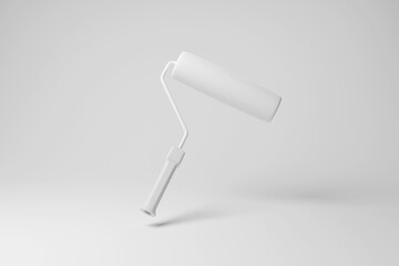 White paint roller floating in mid air on gray background. Illustration as design element for website templates and slide show presentations