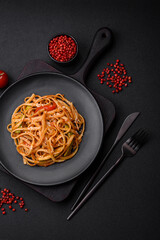 Delicious asian udon dish with vegetables, mushrooms, salt and spices
