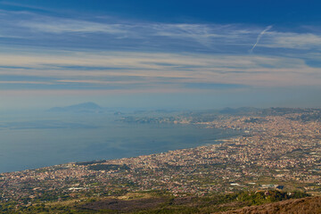 Obraz premium Panoramic view from volcano Mount Vesuvius on the bay of Naples, Province of Naples, Campania region, Italy, Europe. Looking at the island of Capri and Mediterranean coastline on a cloudy day.