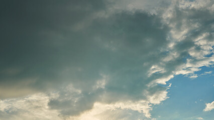 A terrible black cloud hangs in the sky before the rain. Bad weather. Hurricane and thunder over the city. Climate change and natural disasters. Bad mood and despondency.