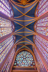 Monumental interior of Sainte-Chapelle with stained glass windows, upper level of royal chapel in the Gothic style. Palais de la Cite, Paris, France