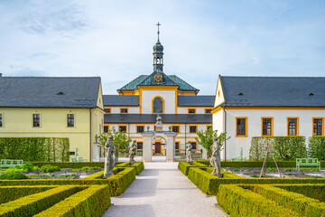 Herbal gardens of Kuks baroque hospital complex on sunny summer day, Czech Republic