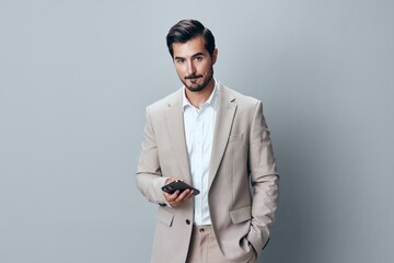 smartphone man phone call happy business beard smile hold suit portrait