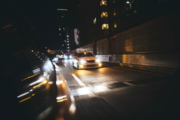 car in the city Tokyo at night