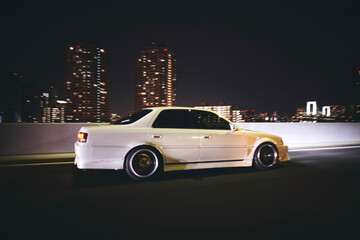 car in the city Tokyo at night