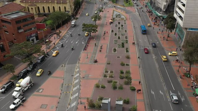 Aerial view of the Colombian capital's Seventh Avenue with several exits to other avenues between modern buildings. Bogot&aacute;. Colombia. June 28, 2023.