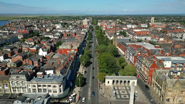 Southport, Lancashire, UK, June 24, 2023; Mid-level aerial fly along clip video footage of the North section of Lord Street in Southport, England