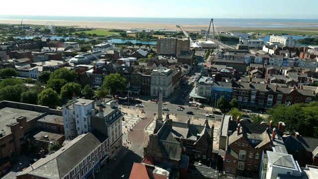 Southport, Lancashire, UK, June 24, 2023; Mid-level aerial orbital clip video footage of the war memorial and cenotaph on Lord Street in Southport, England