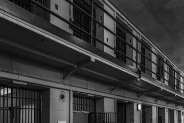 Empty cell range at Kingston Penitentiary, bars, cells, doors, nobody