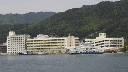 Hiroshima,Japan - June 23, 2023: A ferry connecting port Tateishi and port Habu

