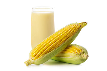 Fresh sweet corn juice in glass ( corn milk ) with corn on the cob on white background.