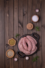 Fototapeta na wymiar Raw sausages in a natural casing