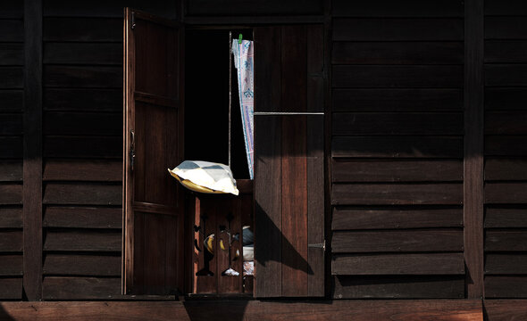 traditional malay wooden house window