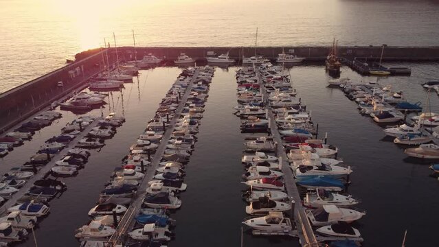 Organized fleet of private boats lined up at Los Gigantes Tenerife