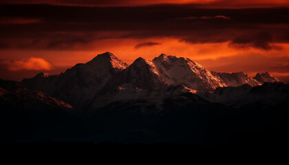 Majestic mountain range silhouette against dramatic backlit sky at dusk generated by AI
