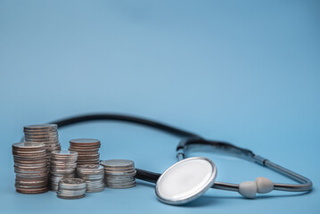 Healthcare Insurance and financial and medical expenses planning stability for patients. Coins and...