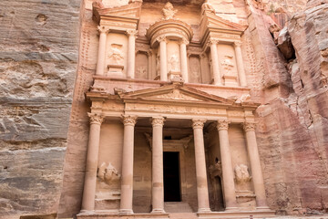 View of Al-Khazneh (The Treasury), one of the most elaborate temples in Petra, an ancient city of the Nabatean Kingdom, in Jordan. This structure was carved out of a sandstone rock face