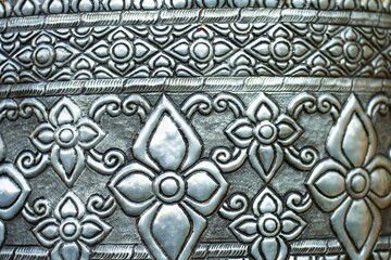 Carved designs from silver plates inside the temple