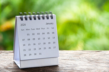 January 2024 table calendar with customizable space for text. Calendar concept and copy space.