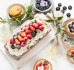 Dessert table. Top view, Summer cake with berries. Healthy dessert concept.