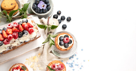 Dessert table. Top view, Summer cake with berries. Healthy dessert concept.