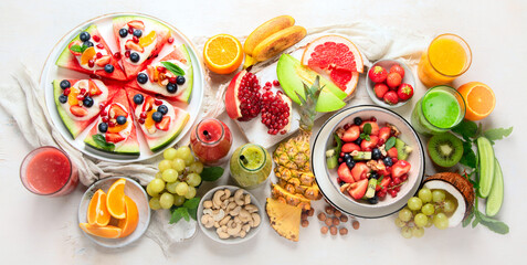 Obraz na płótnie Canvas Summer fruits assorted on white background. Fresh raw food concept.