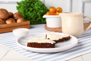 Plate of tasty sandwiches with cream cheese on table