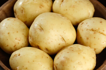 Raw baby potatoes close up