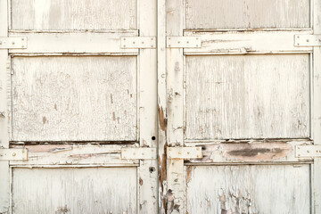 Old weathered painted wooden doors.