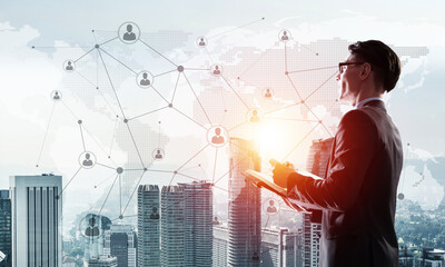 Concept of business success and control with confident boss against cityscape background