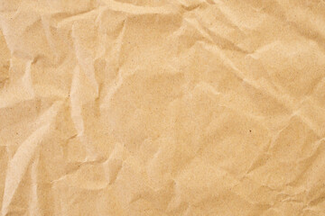 Abstract brown crumpled creased recycle paper texture background
