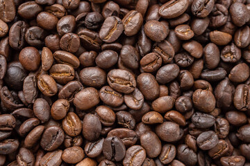 Fresh roasted brown coffee beans background