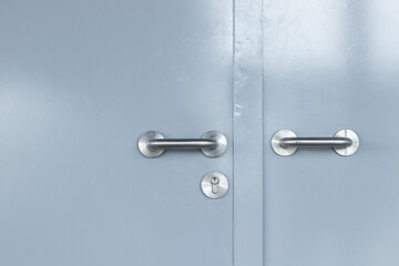 stainless aluminium handles on steel door
