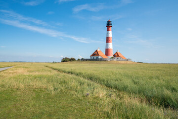 Fototapeta na wymiar Westerheversand Lighthouse, Westerhever, Nordfriesland, Schleswig-Holstein, Germany
